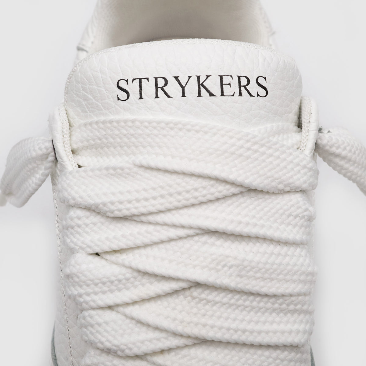 StrikeOne - White Leather